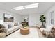 Cozy living room with comfortable seating and ample natural light, perfect for relaxation at 5774 Crown Ter, Hickory, NC 28601