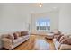 Cozy sitting room with hardwood floors and large window at 5774 Crown Ter, Hickory, NC 28601