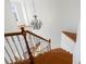 Elegant wooden staircase with chandelier and high ceilings at 5774 Crown Ter, Hickory, NC 28601