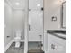 Bathroom with walk-in shower, toilet and vanity at 591 Shiloh Rd, Statesville, NC 28677