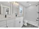 Bathroom with double vanity, tub, and tile shower at 591 Shiloh Rd, Statesville, NC 28677