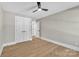 Spacious bedroom with double doors and hardwood floors at 591 Shiloh Rd, Statesville, NC 28677