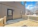 Newly built wooden deck with railing and access to a back door at 591 Shiloh Rd, Statesville, NC 28677