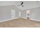 Main bedroom with hardwood floors, ceiling fan and ensuite bath at 591 Shiloh Rd, Statesville, NC 28677