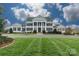 Elegant clubhouse with columns and manicured lawn at 6014 Cadence Ln, Fort Mill, SC 29707