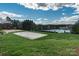 Community features basketball and volleyball courts, and pond at 6014 Cadence Ln, Fort Mill, SC 29707