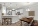 Modern kitchen with stainless steel appliances and an island at 6014 Cadence Ln, Fort Mill, SC 29707