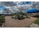 Community playground with playset and shaded seating area at 6014 Cadence Ln, Fort Mill, SC 29707