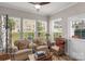 Sunroom featuring wicker chairs and a coffee table at 6014 Cadence Ln, Fort Mill, SC 29707