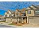 Three townhouses with brick and stone exterior at 6014 Cadence Ln, Fort Mill, SC 29707