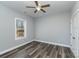 Bedroom with ceiling fan and a window with blinds at 619 Norland Ave, Kannapolis, NC 28083