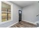 Bright entryway with hardwood floors and a black front door at 619 Norland Ave, Kannapolis, NC 28083