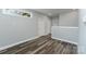 Modern hallway with light gray walls and wood-look floors at 619 Norland Ave, Kannapolis, NC 28083