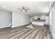 Spacious living room with hardwood floors and a ceiling fan at 619 Norland Ave, Kannapolis, NC 28083