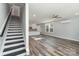 Modern staircase with black and white risers leading to the second floor at 619 Norland Ave, Kannapolis, NC 28083