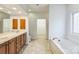Bathroom with double sinks, soaking tub and walk-in closet access at 629 Cordova Ct, Salisbury, NC 28146