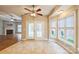 Bright kitchen area with view of the living room, featuring stainless appliances and white cabinets at 629 Cordova Ct, Salisbury, NC 28146