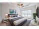 Main bedroom with a king-size bed and large window at 629 Cordova Ct, Salisbury, NC 28146