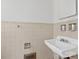 Small bathroom with tiled walls and a sink at 6439 Montpelier Rd, Charlotte, NC 28210