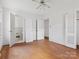 Bedroom with hardwood floors and access to bathroom at 6439 Montpelier Rd, Charlotte, NC 28210