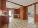 Retro kitchen with wood paneling and vintage appliances at 6439 Montpelier Rd, Charlotte, NC 28210