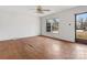 Living room with hardwood floors and large windows at 6439 Montpelier Rd, Charlotte, NC 28210