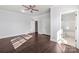 Main bedroom with ensuite bathroom access and hardwood floors at 646 Central Nw Dr, Concord, NC 28027