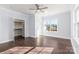 Bedroom with walk-in closet and hardwood floors at 646 Central Nw Dr, Concord, NC 28027