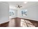 Spacious bedroom with hardwood floors and large windows at 646 Central Nw Dr, Concord, NC 28027