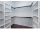 Large walk-in closet with shelving and hanging rods at 646 Central Nw Dr, Concord, NC 28027