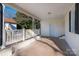 Covered porch with white railings and light fixture at 646 Central Nw Dr, Concord, NC 28027