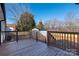 Back deck with wooden railing overlooking backyard at 646 Central Nw Dr, Concord, NC 28027