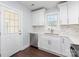 Stainless steel appliances and white cabinetry at 646 Central Nw Dr, Concord, NC 28027