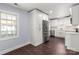 Modern kitchen with white cabinets, stainless steel appliances at 646 Central Nw Dr, Concord, NC 28027