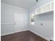 Laundry room features a door to backyard and built-in shelving at 646 Central Nw Dr, Concord, NC 28027