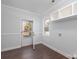 Laundry room with door leading to a deck and built-in shelving at 646 Central Nw Dr, Concord, NC 28027