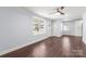 Bright and airy living room, hardwood floors at 646 Central Nw Dr, Concord, NC 28027