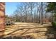 Spacious backyard with mature trees and privacy at 6700 Fairhope Ct, Charlotte, NC 28277