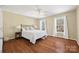 Spacious bedroom featuring hardwood floors and natural light at 6700 Fairhope Ct, Charlotte, NC 28277