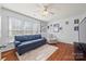 Cozy bedroom with hardwood floors and a comfortable couch at 6700 Fairhope Ct, Charlotte, NC 28277