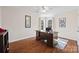 Home office with hardwood floors and large windows at 6700 Fairhope Ct, Charlotte, NC 28277