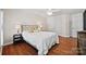 Bright bedroom with hardwood floors and double closets at 6700 Fairhope Ct, Charlotte, NC 28277