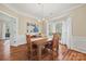 Spacious dining area with hardwood floors and large windows at 6700 Fairhope Ct, Charlotte, NC 28277