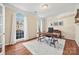 Bright home office with hardwood floors and large windows at 6700 Fairhope Ct, Charlotte, NC 28277