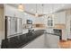 Modern kitchen with stainless steel appliances and granite countertops at 6700 Fairhope Ct, Charlotte, NC 28277