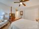 Well-lit bedroom with a queen-size bed and ample closet space at 6706 Blackwood Ln, Waxhaw, NC 28173