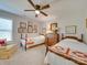 Charming bedroom featuring twin beds, antique dresser, and wall art at 6706 Blackwood Ln, Waxhaw, NC 28173