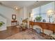 Bright and airy entryway with hardwood floors and stylish console tables at 6706 Blackwood Ln, Waxhaw, NC 28173