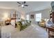 Spacious main bedroom with high ceilings, a large bed, and ample natural light at 6706 Blackwood Ln, Waxhaw, NC 28173