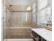 Large walk-in shower with built-in seat and tile surround at 680 Chase Ct, Fort Mill, SC 29708